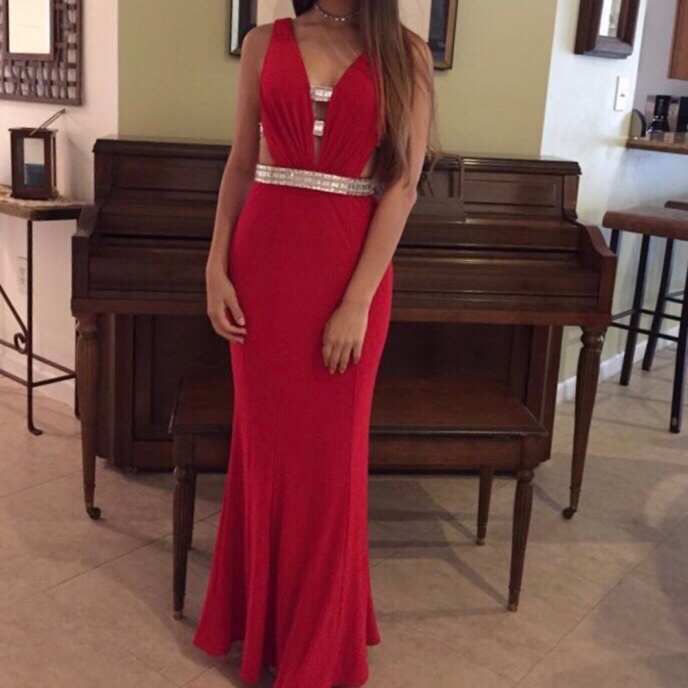 Red Jovani prom dress with cut out sides